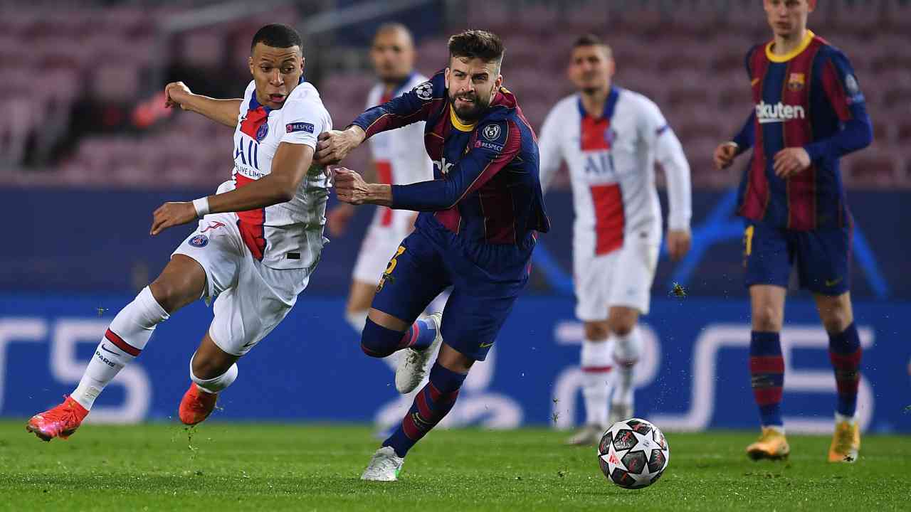 Kylian Mbappé e Gerard Piqué