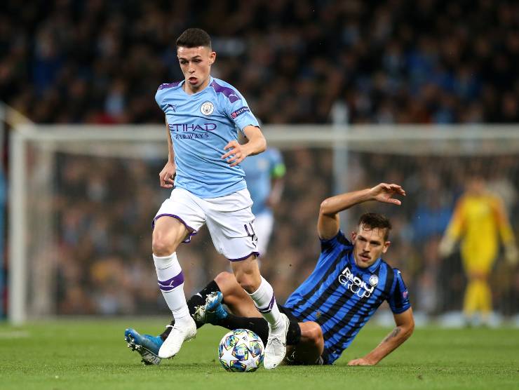 Toloi contro Foden - Getty Images